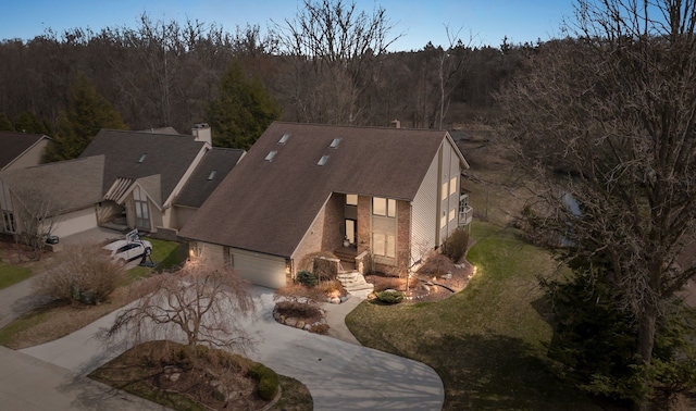 aerial view featuring a view of trees