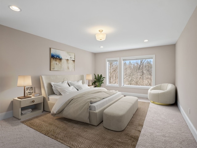 bedroom with recessed lighting and carpet