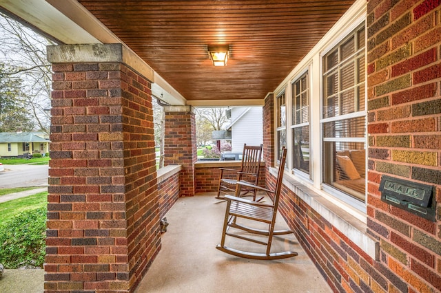 view of patio featuring a porch