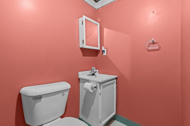 half bath with a sink and toilet