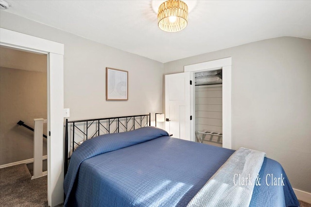 bedroom with carpet floors and baseboards