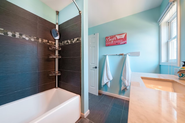 135 California Ave, Muskegon, MI 49445 - bathroom with baseboards, a sink, and washtub / shower combination