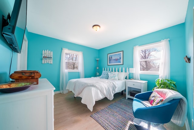 135 California Ave, Muskegon, MI 49445 - bedroom featuring light wood-style floors