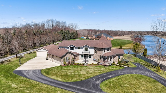 7455 Groveland Rd, Holly, MI 48442 - drone / aerial view with a wooded view and a water view