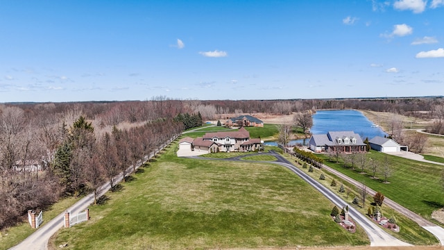 7455 Groveland Rd, Holly, MI 48442 - birds eye view of property featuring a wooded view and a water view