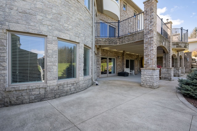 7455 Groveland Rd, Holly, MI 48442 - back of house with a patio and a balcony
