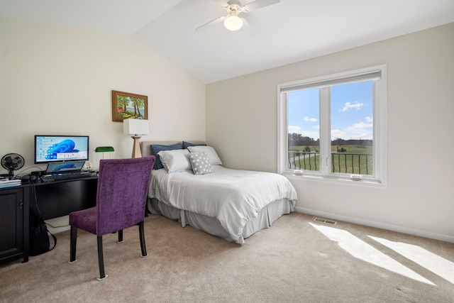 7455 Groveland Rd, Holly, MI 48442 - bedroom featuring lofted ceiling, a ceiling fan, visible vents, and light carpet