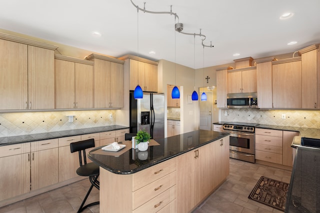 7455 Groveland Rd, Holly, MI 48442 - kitchen featuring light brown cabinets and stainless steel appliances