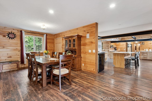 2697 N 176th Ave, Walkerville, MI 49459 - dining room with wood walls, dark wood-style floors, recessed lighting, and beverage cooler