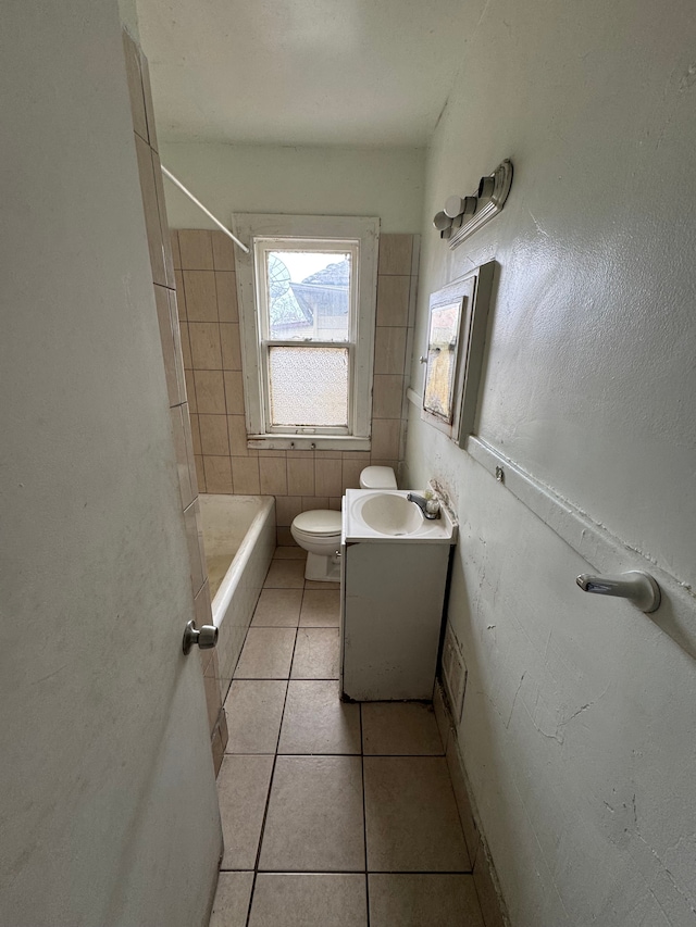 full bath with vanity, toilet, and tile patterned flooring