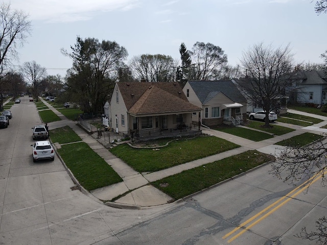 2011 Goddard Rd, Lincoln Park, MI 48146 - exterior space featuring a front lawn and covered porch