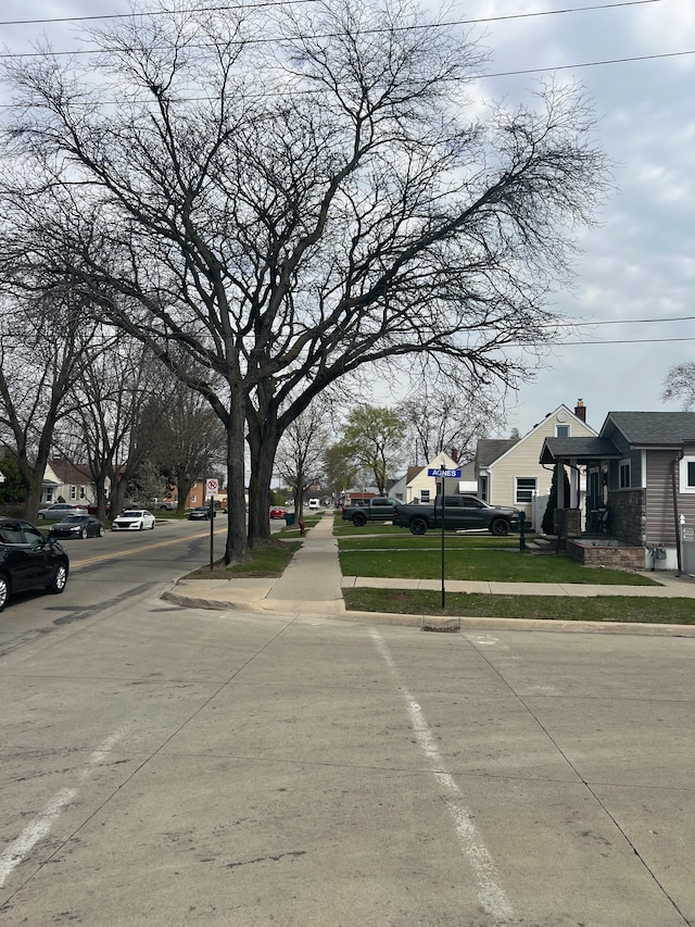 2011 Goddard Rd, Lincoln Park, MI 48146 - view of street with curbs, sidewalks, and a residential view