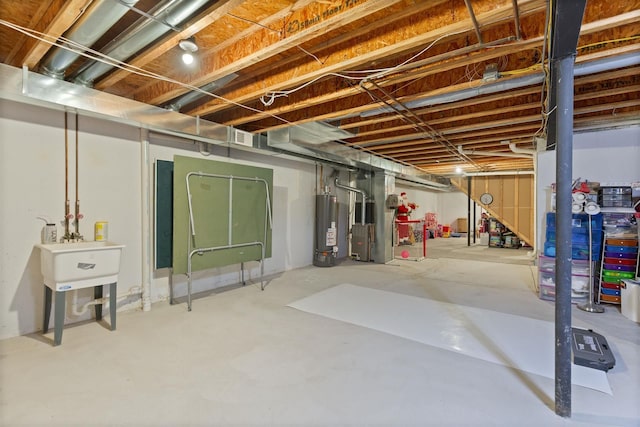 unfinished basement with heating unit and gas water heater
