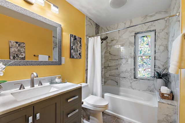 full bathroom featuring shower / tub combo with curtain, toilet, and vanity