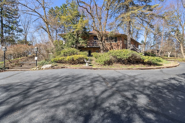 view of home's exterior with stairs