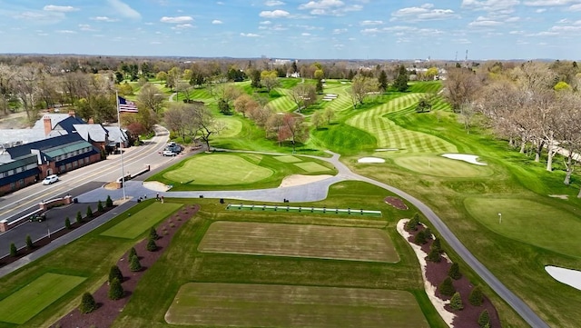 birds eye view of property featuring golf course view