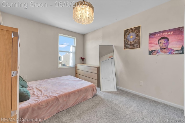 51306 Kirby Dr, Chesterfield, MI 48047 - carpeted bedroom with a chandelier and baseboards