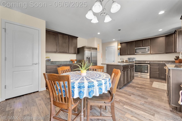 51306 Kirby Dr, Chesterfield, MI 48047 - dining area featuring a chandelier, light wood-type flooring, and recessed lighting