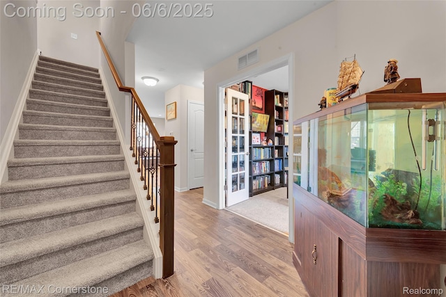 51306 Kirby Dr, Chesterfield, MI 48047 - stairs with wood finished floors and baseboards
