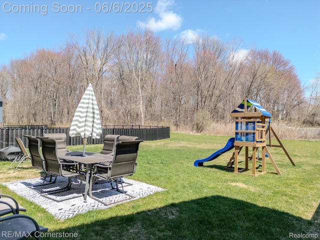 51306 Kirby Dr, Chesterfield, MI 48047 - view of yard featuring a playground, a patio, and outdoor dining area