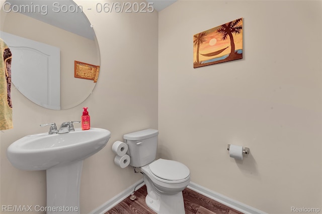 51306 Kirby Dr, Chesterfield, MI 48047 - bathroom featuring baseboards, toilet, wood finished floors, and a sink