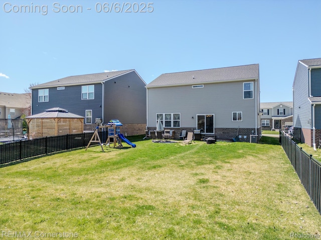 51306 Kirby Dr, Chesterfield, MI 48047 - rear view of property with a gazebo, a playground, and central AC