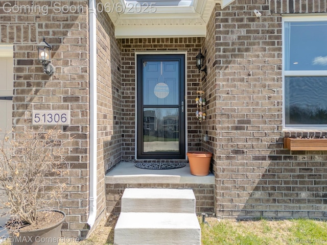 51306 Kirby Dr, Chesterfield, MI 48047 - view of exterior entry with brick siding