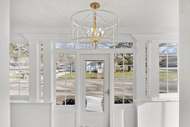 516 W Detroit St, New Buffalo, MI 49117 - doorway featuring wooden ceiling and an inviting chandelier