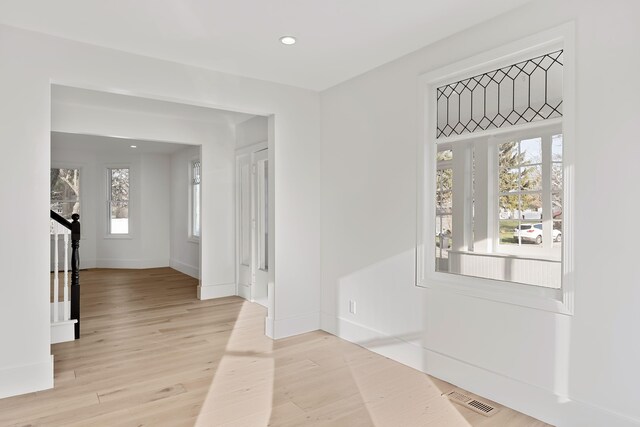 516 W Detroit St, New Buffalo, MI 49117 - interior space with recessed lighting, light wood-style floors, visible vents, and baseboards