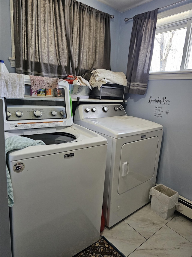 laundry room featuring laundry area and separate washer and dryer