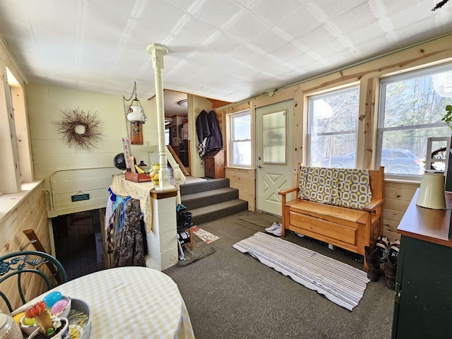 interior space with carpet and stairs