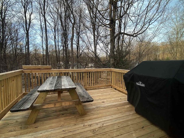 835 Eden St, Kingsley, MI 49649 - wooden deck with outdoor dining space
