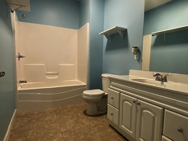 835 Eden St, Kingsley, MI 49649 - full bathroom featuring bathtub / shower combination, tile patterned floors, vanity, and toilet