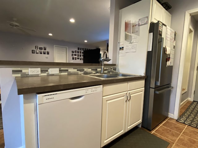 835 Eden St, Kingsley, MI 49649 - kitchen featuring a sink, dark countertops, recessed lighting, ceiling fan, and dishwasher