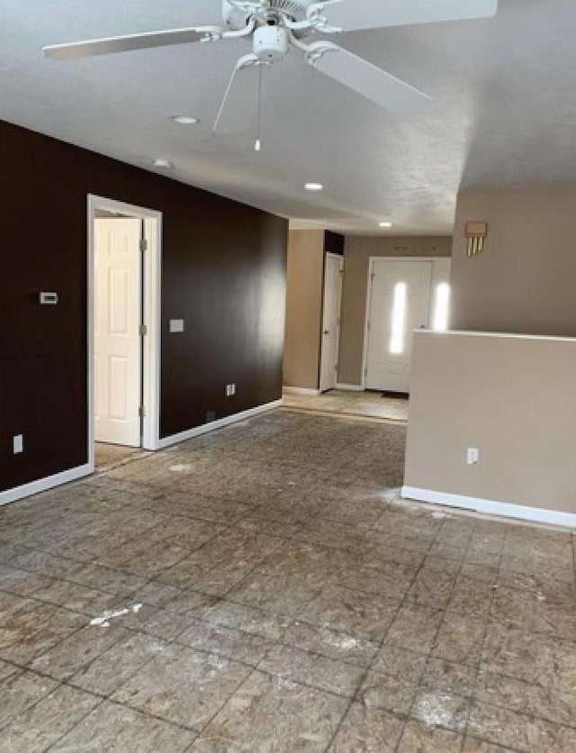 835 Eden St, Kingsley, MI 49649 - spare room with ceiling fan, baseboards, and recessed lighting