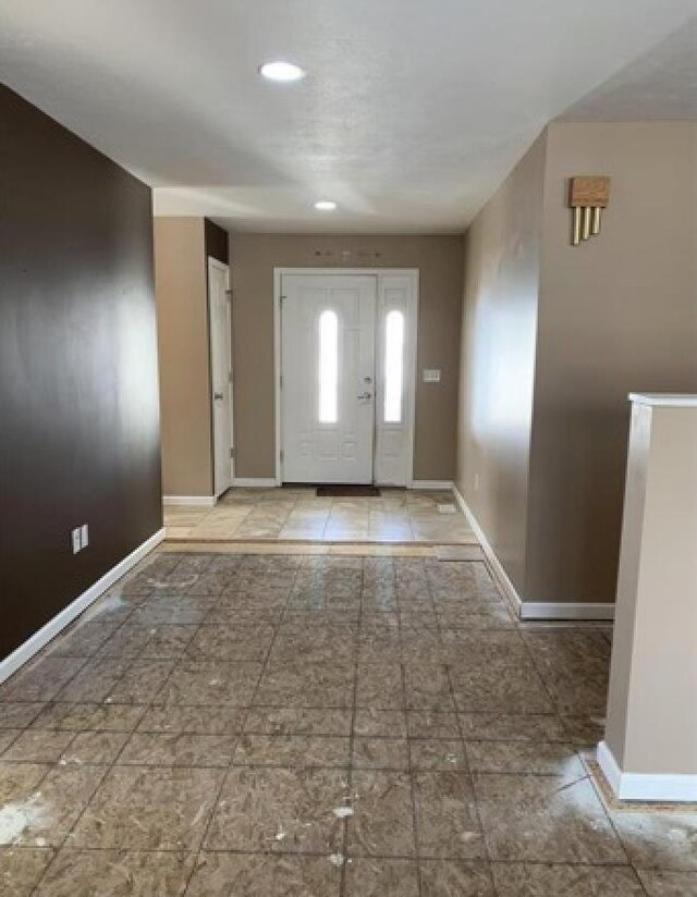 835 Eden St, Kingsley, MI 49649 - entrance foyer with baseboards and recessed lighting