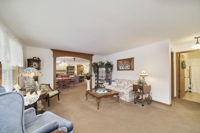 9155 Ivanhoe Dr, Onekama, MI 49675 - carpeted living room with baseboards