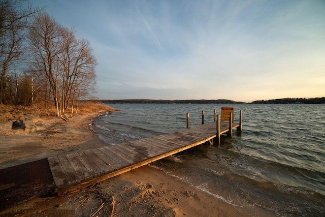9155 Ivanhoe Dr, Onekama, MI 49675 - dock area featuring a water view