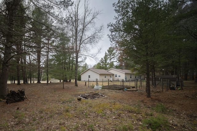 9155 Ivanhoe Dr, Onekama, MI 49675 - view of yard featuring fence