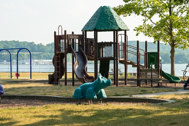 9155 Ivanhoe Dr, Onekama, MI 49675 - communal playground with a lawn