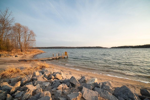 9155 Ivanhoe Dr, Onekama, MI 49675 - view of dock with a water view