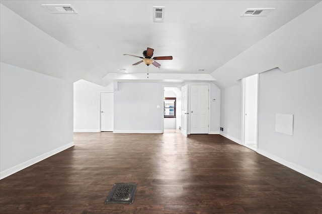 additional living space with ceiling fan, lofted ceiling, and visible vents