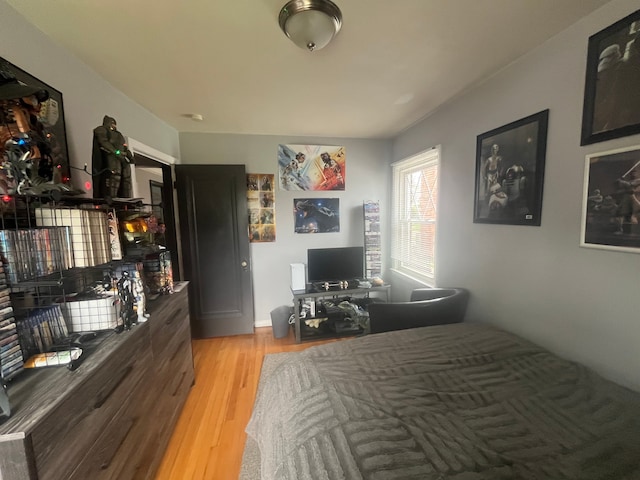 bedroom with light wood-type flooring
