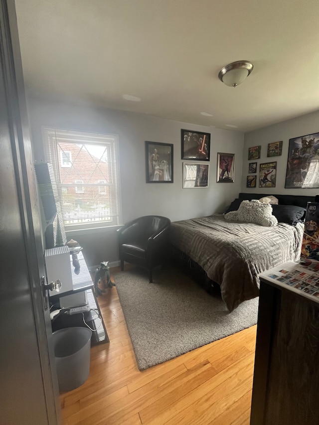 bedroom featuring light wood-style floors
