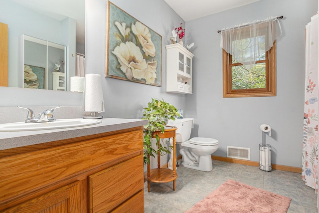 full bathroom with vanity, baseboards, toilet, tile patterned flooring, and visible vents
