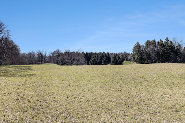 view of landscape with a view of trees