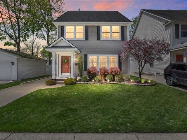 view of front of home with a yard
