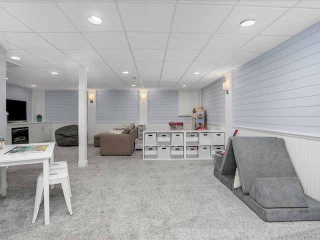 game room with recessed lighting, a drop ceiling, carpet, and wine cooler