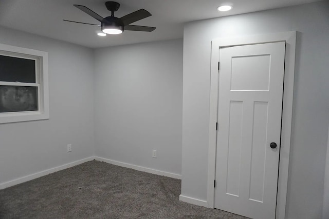 unfurnished room featuring baseboards, a ceiling fan, dark colored carpet, and recessed lighting