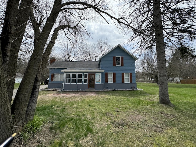 8066 Talladay Rd, Whittaker, MI 48190 - back of property with a yard and roof with shingles